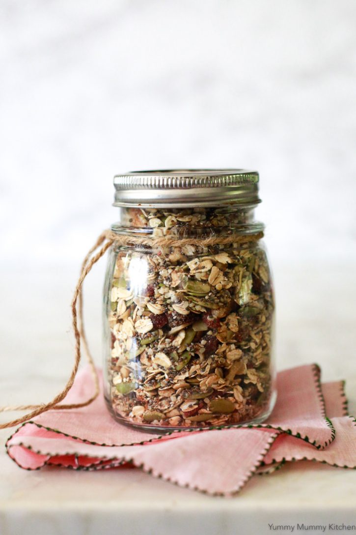 A jar of mixed Bircher muesli ready to be soaked overnight, or eaten hot or cold for a healthy vegan breakfast. 